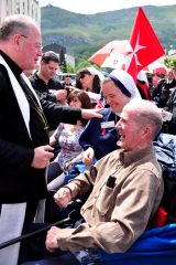 2011 Lourdes Pilgrimage - Archbishop Dolan with Malades (209/267)